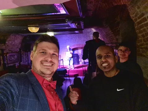 Konrad with friends in a comedy club