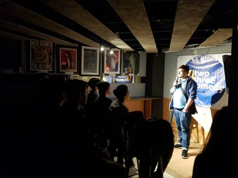 Konrad on stage at Two Three Comedy Club, Taipei, 2017